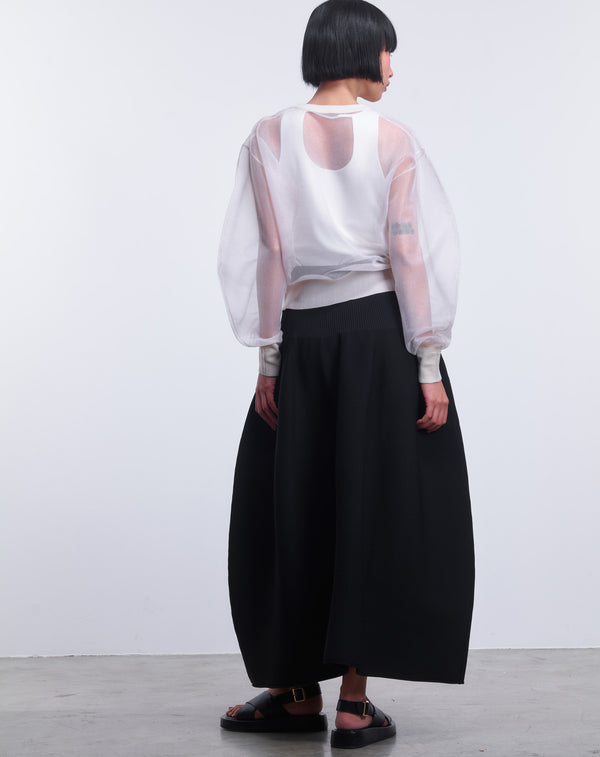 VOLUMINOUS FLARED KNIT SKIRT