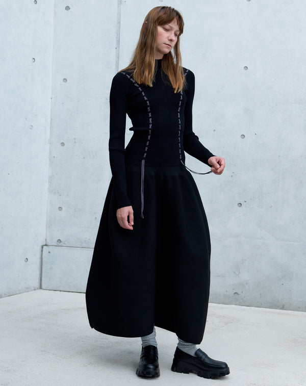 VOLUMINOUS FLARED KNIT SKIRT