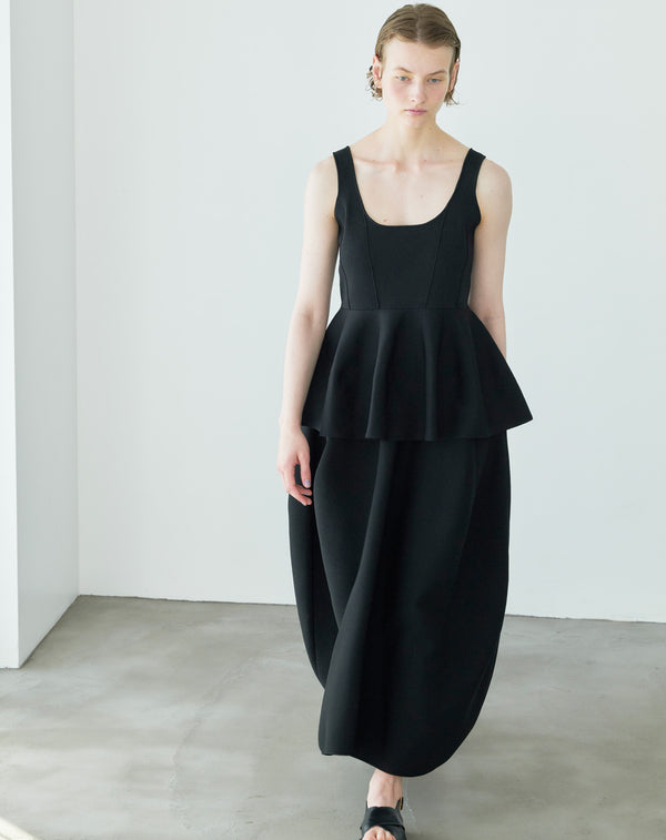 VOLUMINOUS FLARED KNIT SKIRT