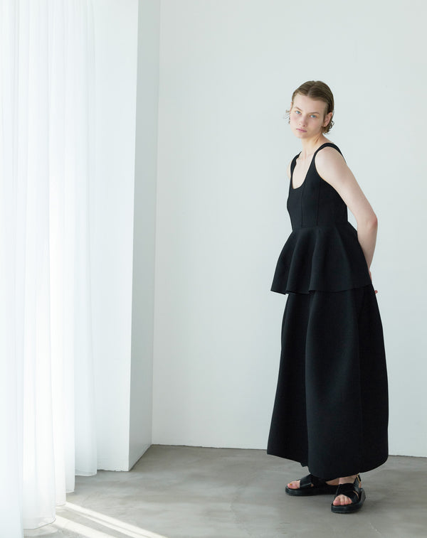 VOLUMINOUS FLARED KNIT SKIRT