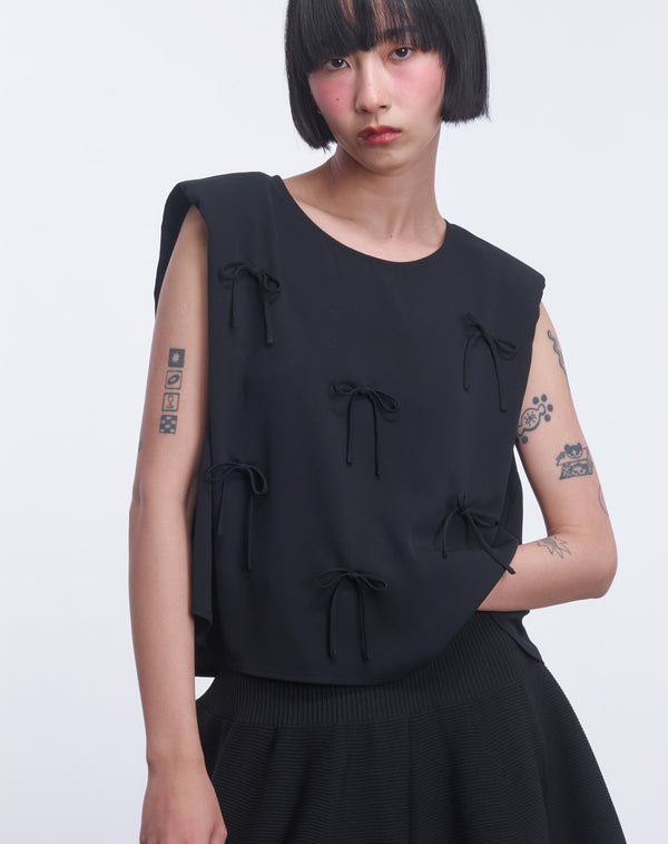 MULTI STRING BOW SLEEVELESS TOP