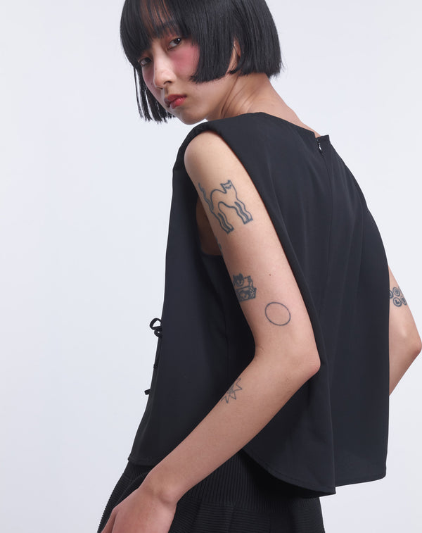 MULTI STRING BOW SLEEVELESS TOP
