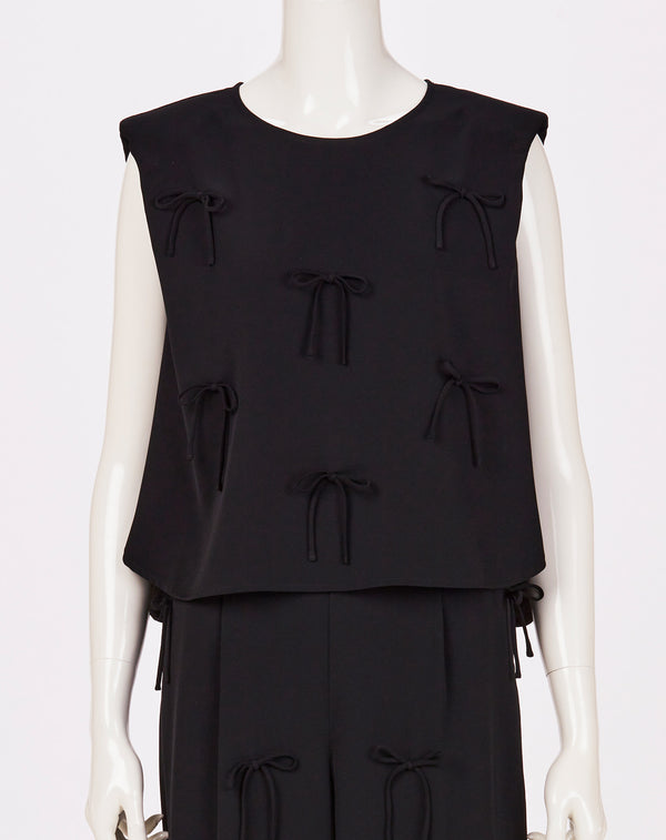 MULTI STRING BOW SLEEVELESS TOP