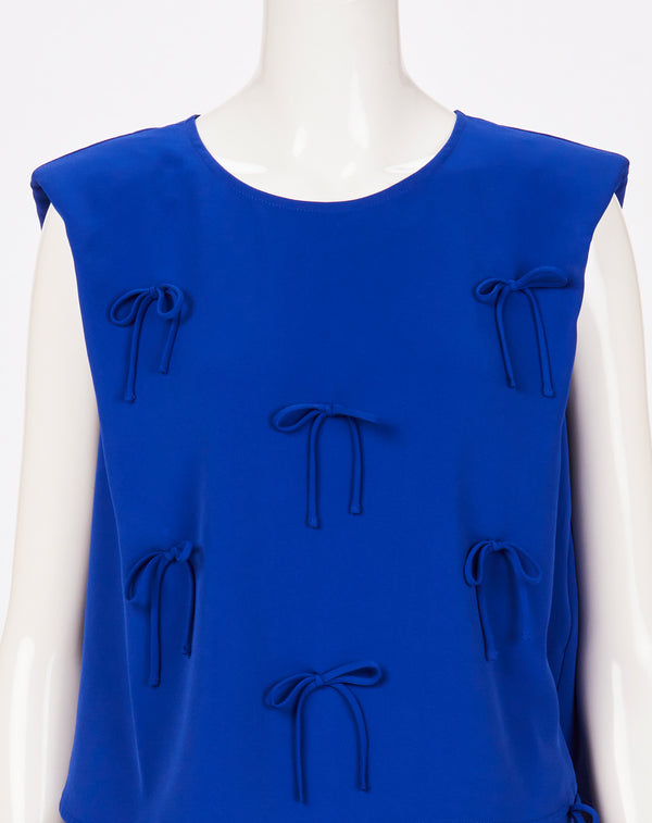 MULTI STRING BOW SLEEVELESS TOP