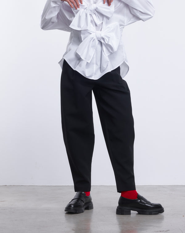 CURVED-SILHOUETTE PANTS