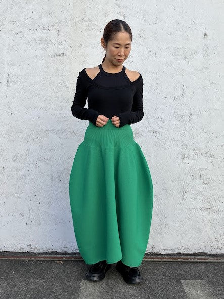 VOLUMINOUS FLARED KNIT SKIRT