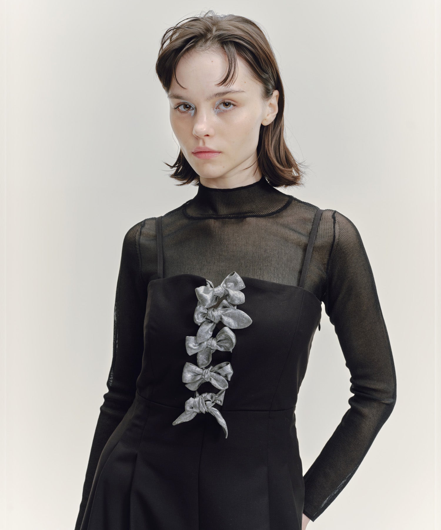 SHEER RIBBED HIGH NECK KNIT