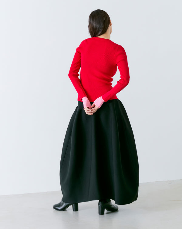 VOLUMINOUS FLARED KNIT SKIRT