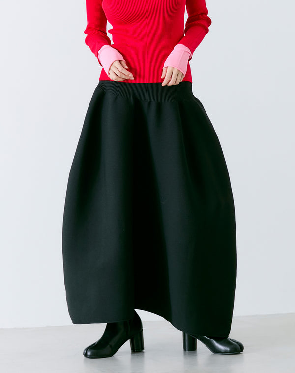 VOLUMINOUS FLARED KNIT SKIRT