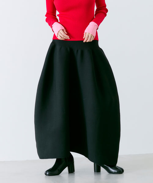 VOLUMINOUS FLARED KNIT SKIRT