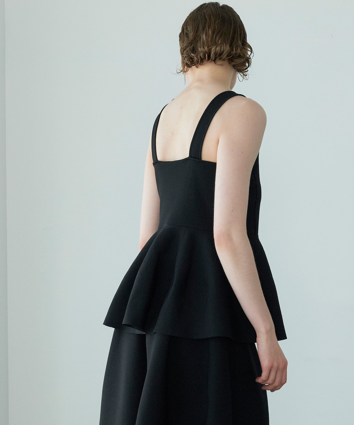 PEPLUM KNIT BUSTIER